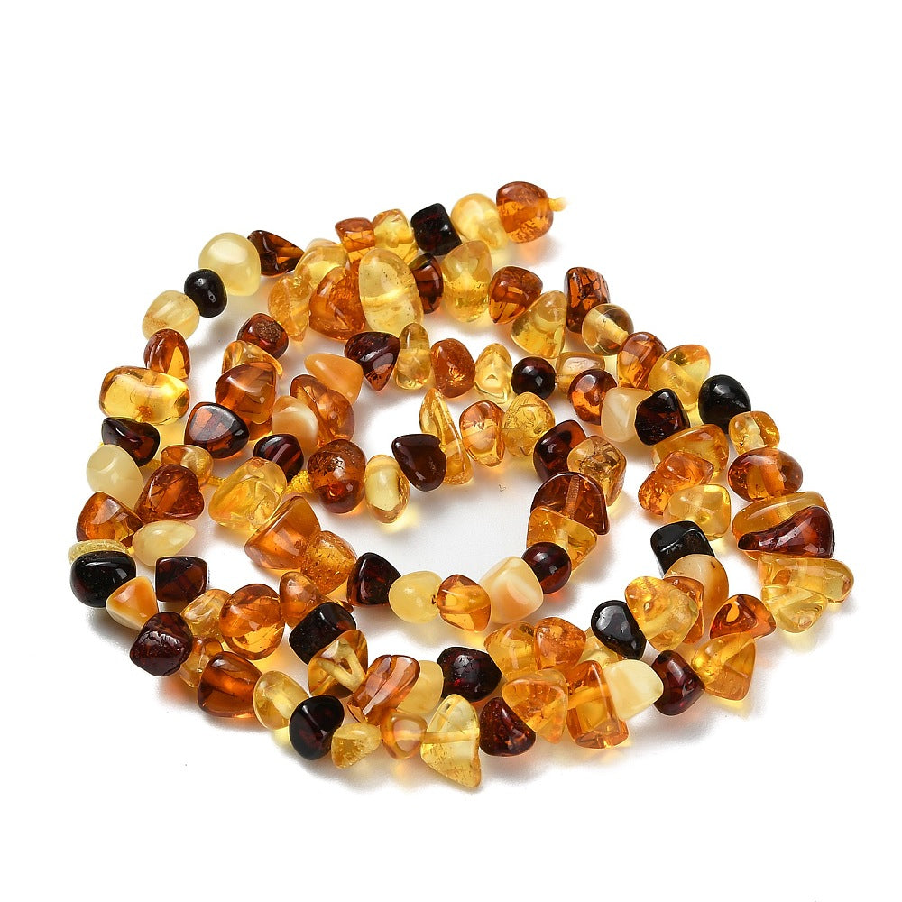 Amber Beads Natural – Tumbled Nuggets 4×11×5×7×3–6mm (Approx. 15.5” Strand) The Pink Bead Shop