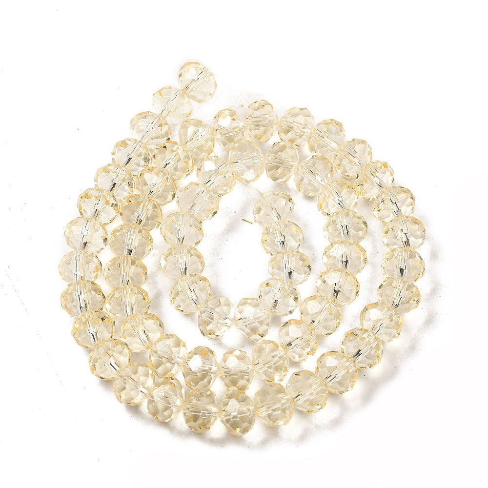 8×6mm Transparent Baking Paint Glass Faceted Rondelle Bead Strand – Navajo White | The Pink Bead Shop Canada