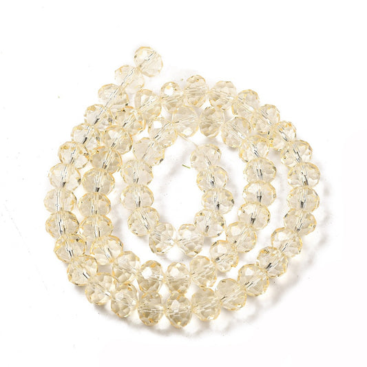 8×6mm Transparent Baking Paint Glass Faceted Rondelle Bead Strand – Navajo White | The Pink Bead Shop Canada